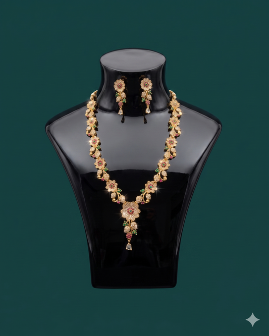 Padma Lakshmi - Elegant Floral CZ Necklace Set with Ruby & Emerald Accents – Gold Finish Bridal Jewelry